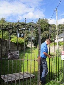Brenden O'Riorden at gate to Church yard 2016